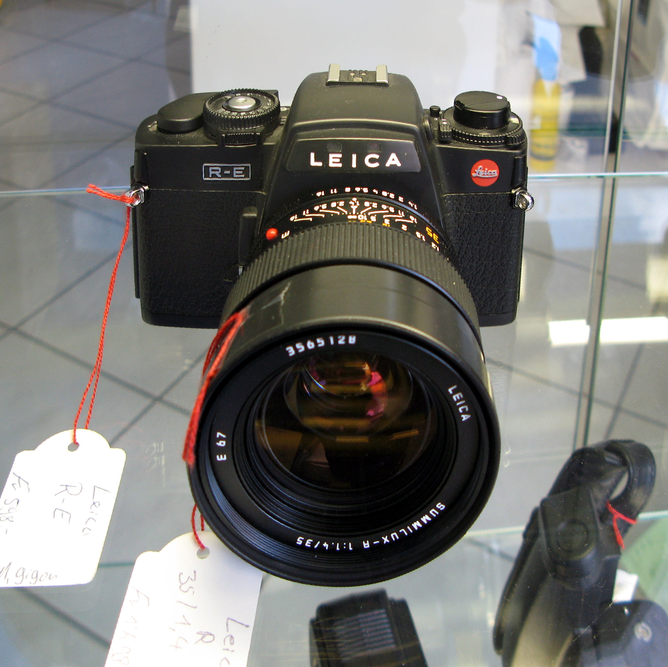 Leica R-mount lens, showing the characteristic all-metal construction and aperture ring
